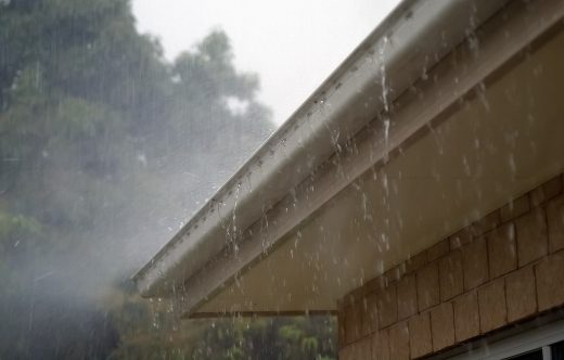 Flat roof vs pitched home gutter rain