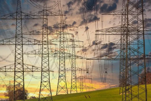 Electric pylons sunset landscape