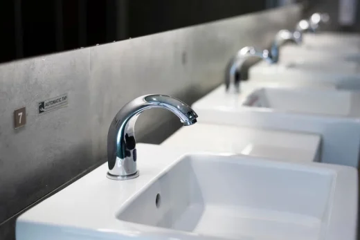 Touchless faucets and soap dispensers