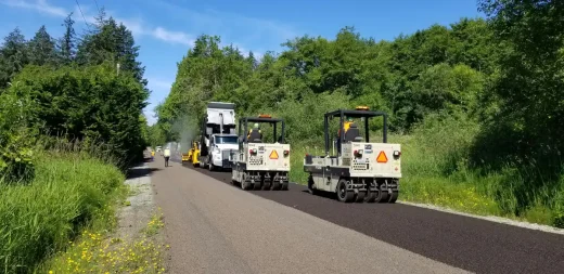 Asphalt paving USA road in wood